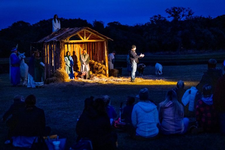 Families watching the live nativity at Splashway Campground